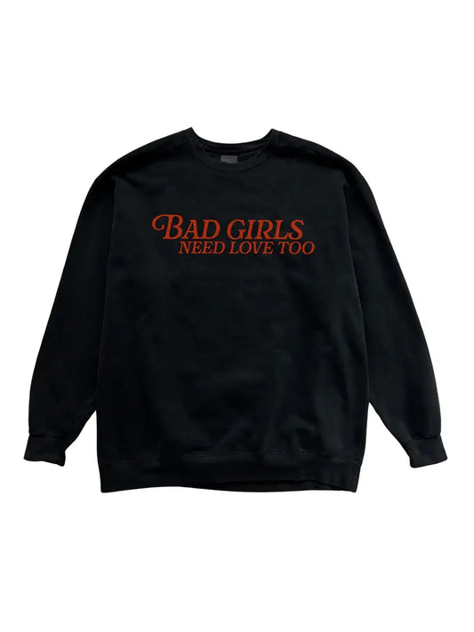 Black sweatshirt with red text 'Bad Girls Need Love Too' on a white background